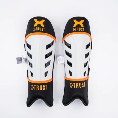 Canillera Hockey Armor Pro Naranja | Protección, Comodidad y Alto Rendimiento