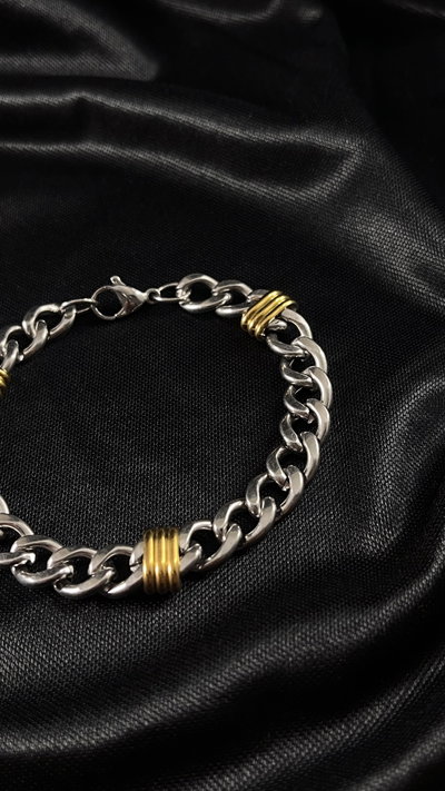 Pulsera dorado y plata. Acero quirúrgico 