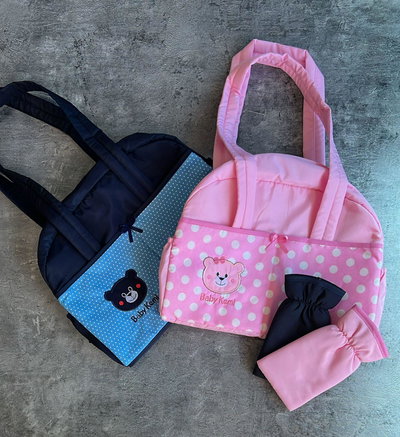 Bolso maternal con porta mamadera y cambiador 