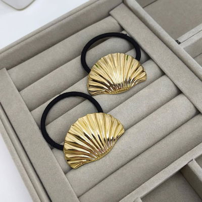 COLITA DE PELO CON APLIQUE DORADO X UNIDAD