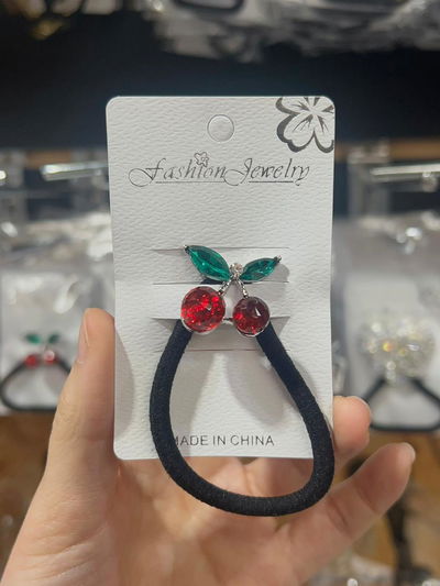 COLITA DE PELO CON APLIQUE PLATEADO Y STRASS X UNIDAD