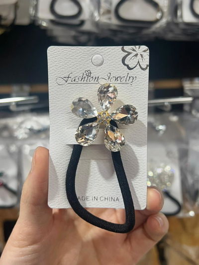 COLITA DE PELO CON APLIQUE DORADO Y STRASS X UNIDAD