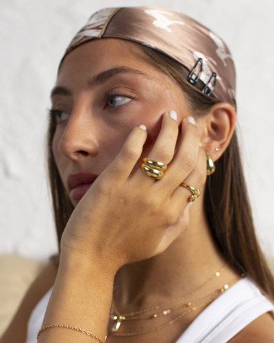 ANILLOS DE ACERO DORADO SURTIDO X 3 UNIDADES