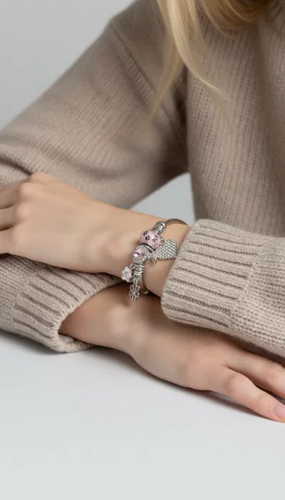 PULSERA ESCLAVA DE ACERO CON DIJES X UNIDAD