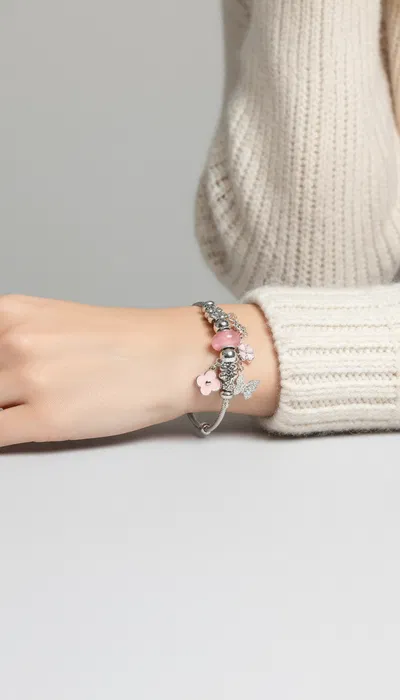 PULSERA ESCLAVA DE ACERO CON DIJES X UNIDAD