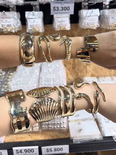 PULSERA SERPIENTE CON PATRÓN ESCAMA DE METAL DORADO X UNIDAD