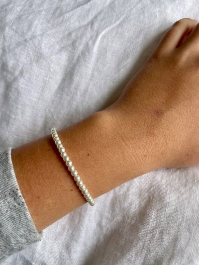 PULSERA PERLAS 0,4 CM X UNIDAD