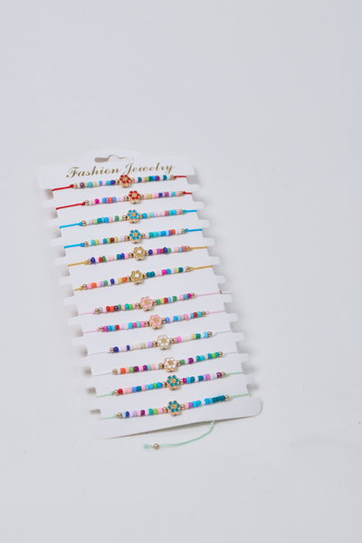 PULSERAS DE HILO CON BOLITAS Y DIJE X 12 X SET