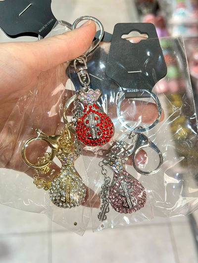 LLAVERO DE CARTERA BOLSO $ X PCS METALICO CON STRASS V.MOD