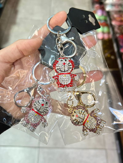 LLAVERO DE CARTERA PERSONAJE X PCS METALICO CON STRASS V.MOD
