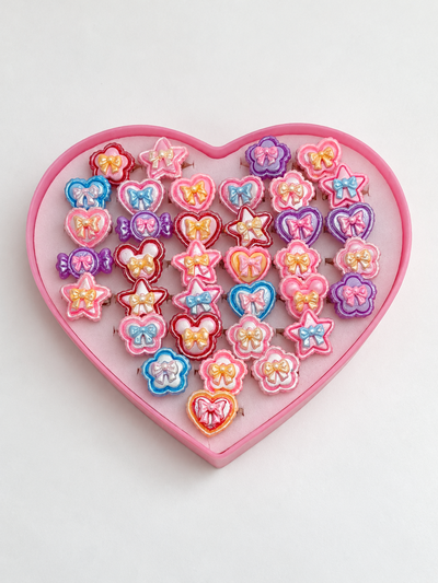 36 ANILLOS INFANTILES EN ESTUCHE CORAZÓN