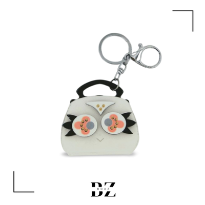 LLAVERO OJITOS FORMA DE CARTERA X UNIDAD