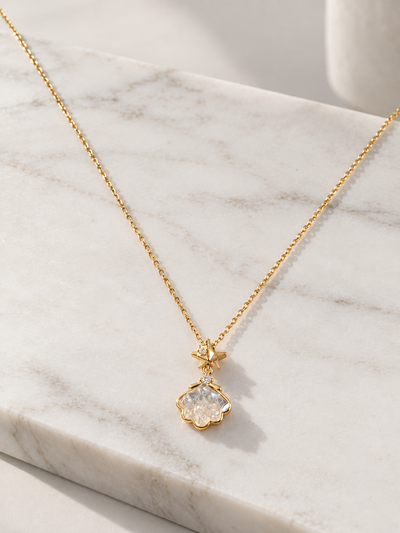 CADENA ACERO DORADO CON OSTRA X UNIDAD