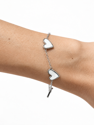 PULSERA DE ACERO CON 5 DIJES X UNIDAD