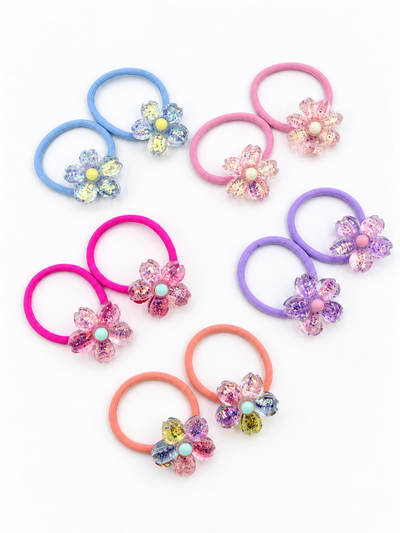 10 PARES DE COLITAS CON FLORES BRILLOSAS X TIRA