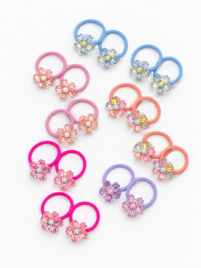 10 PARES DE COLITAS CON FLORES BRILLOSAS X TIRA