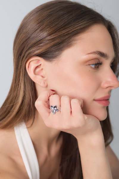ANILLO ACERO REGULABLE FLORES LISAS X UNIDAD