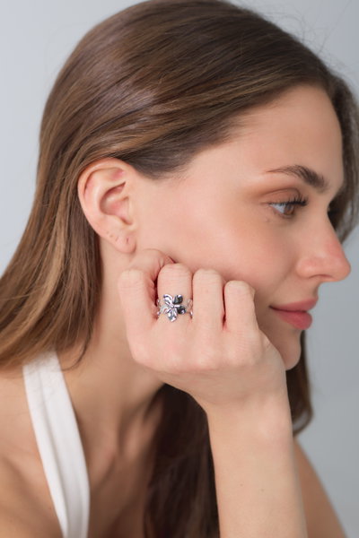 ANILLO ACERO REGULABLE FLORES LISAS X UNIDAD