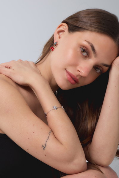 PULSERA ACERO TRES FLORES X UNIDAD
