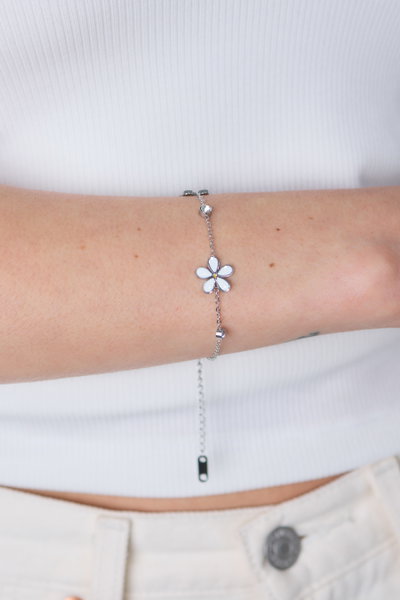 PULSERA ACERO DOS FLORES BLANCAS Y STRASS X UNIDAD