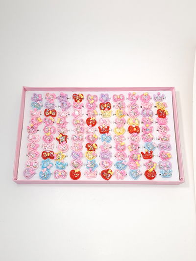 ANILLOS INFANTIL CON APLIQUE X 100 PCS CAJA