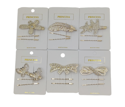 SET HEBILLA C.STRASS Y PAR DE INVISIBLES DORADO X 12 PARES