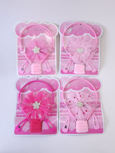 SET CON ACCESORIOS DE PELO Y VINCHA X CARD