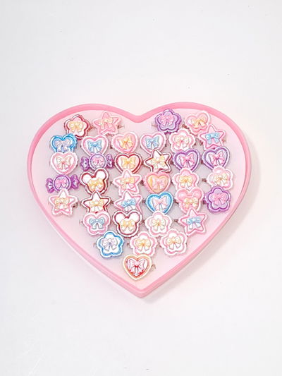 ANILLOS INFANTIL CON APLIQUE X 36 PCS ESTUCHE CORAZON
