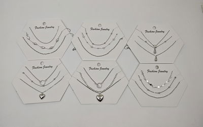 SET DE COLLARES PLATEADOS X CARD