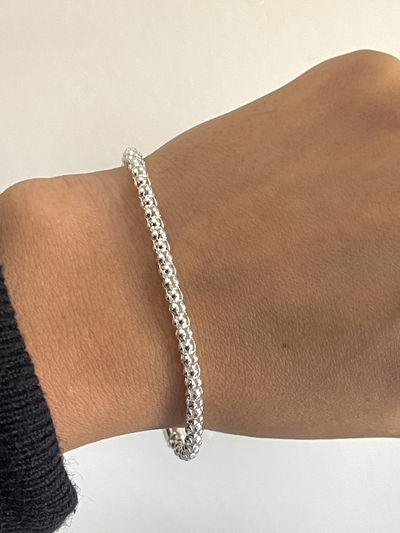 Pulsera canasta gruesa .