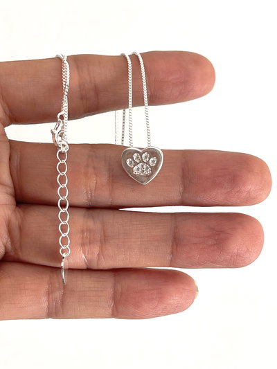 Conjunto dije corazón y huella