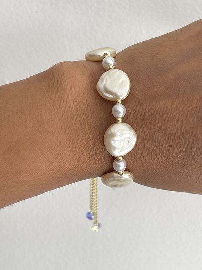 Pulsera símil perla con cierre siliconado