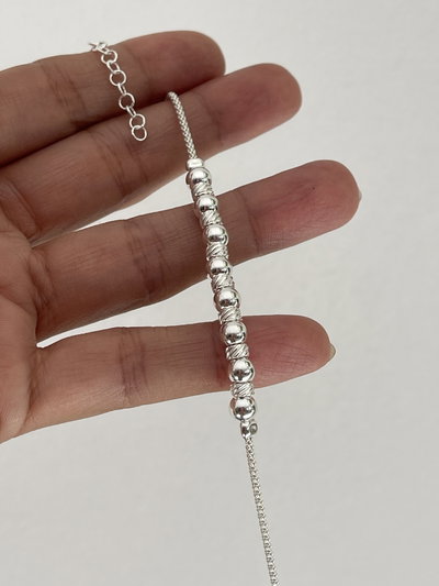 Pulsera bolitas y Donas rayadas 
