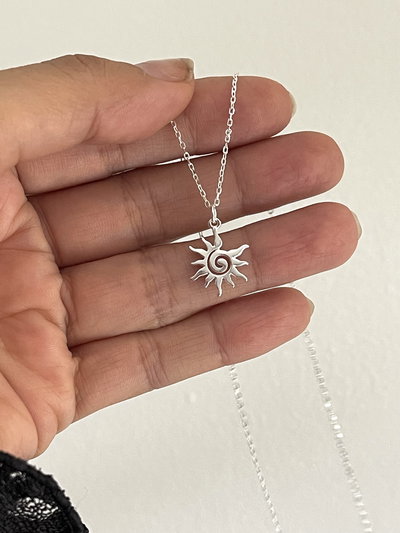 Conjunto cadena y dije sol espiral