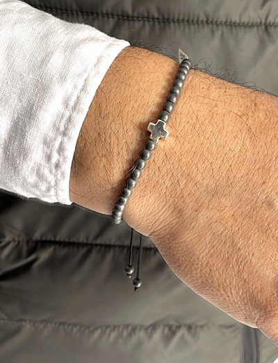 Pulsera piedras naturales ematite opaco y cruz de plata 925