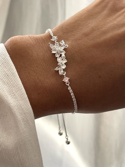 PULSERA FLORES CIERRE SILICONADO