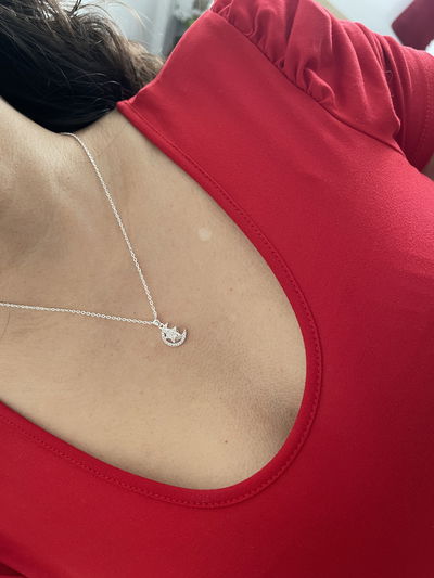 Conjunto luna y estrella con micropave giratorio 
