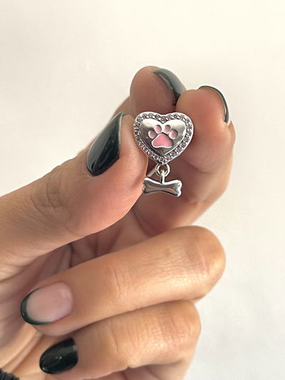 Dije Charms corazón con huella rosa y huesito 