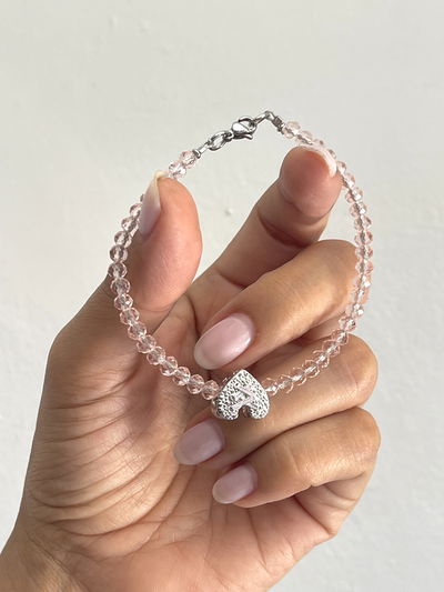 Pulsera cristales rosa con dije corazón 
