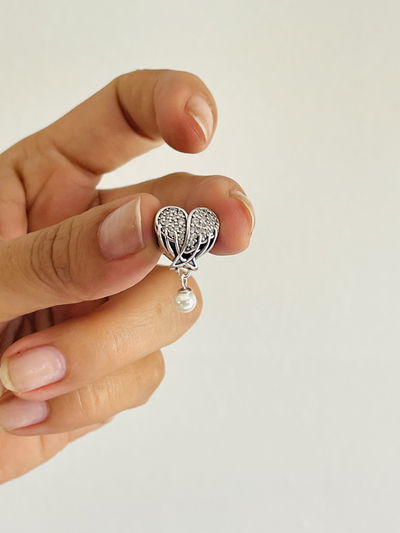 Dije Charms corazón de alas con dije perla 