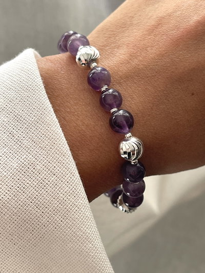 Pulsera combinada de plata con piedras amatistas . 