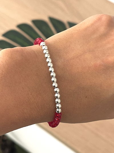 Pulsera  combinada con bolitas y cristales 