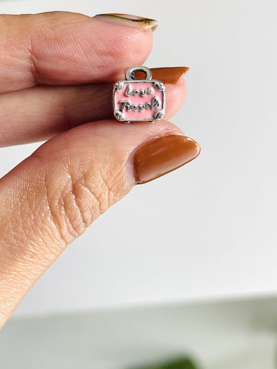 Dije Charms valija “love travels “