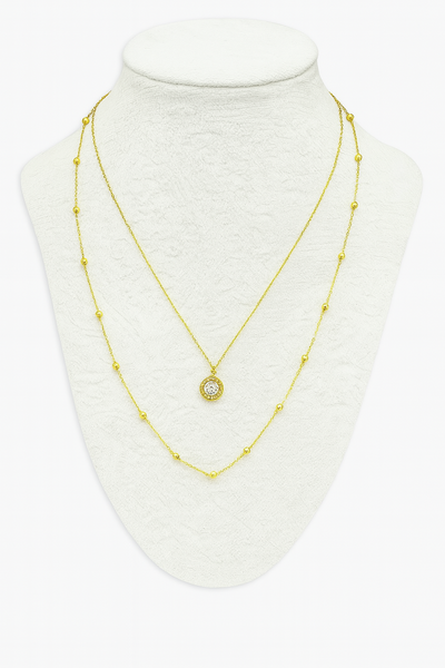 Collar Doble Elegancia Dorada – Acero Quirúrgico con Dije de Brillo y Baño en Oro 18K 