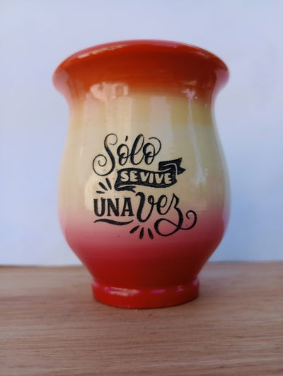 Mate Matearte vitrificado grabado frase 1 - naranja manteca rojo