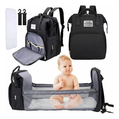 Mochila maternal con cuna y cargador