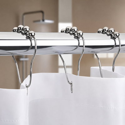 Ganchos cortina baño