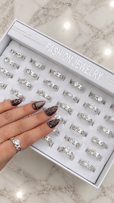 Anillo diamante trenza acero bañado