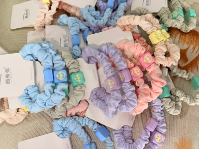 scrunchie dije cara sonriente