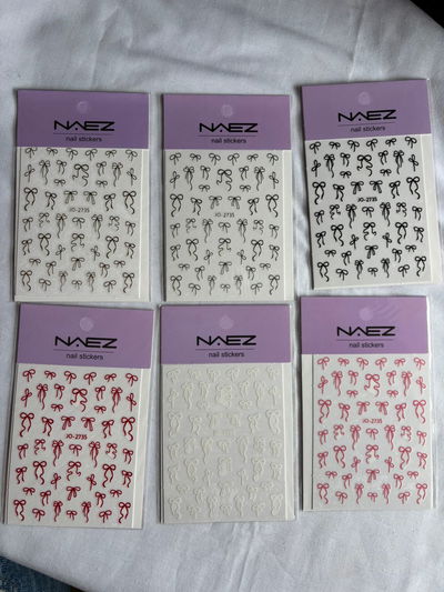 STICKER UÑAS MOÑO